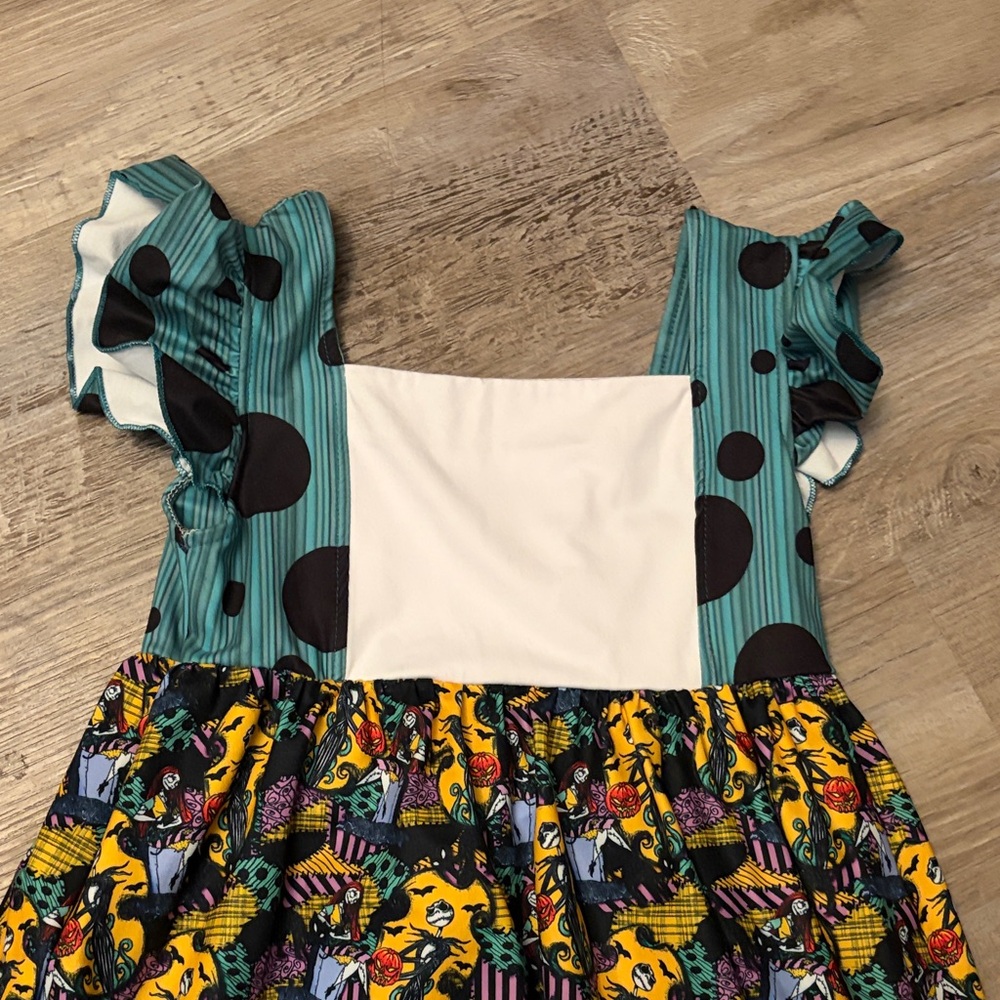 Colorful Ruffled Dress with Character Print - Picture 5 of 5
